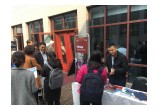 Guests are browsing the Pathways sampler in the NGL China Booth