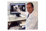 Dr. Farnoosh Consults with One of His Patients