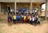 Pascal Nwoga with some of the children he is educating on the Youth for Human Rights curriculum.