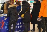 People stood on line to sign the petition by drawing their hands on the scroll and signing it with their favorite article of the Universal Declaration of Human Rights.