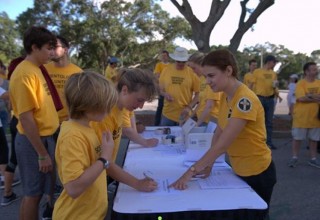 Volunteers sign in and are assigned to teams