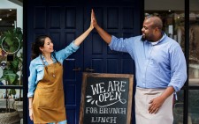 Small Business Owners Celebrating Opening